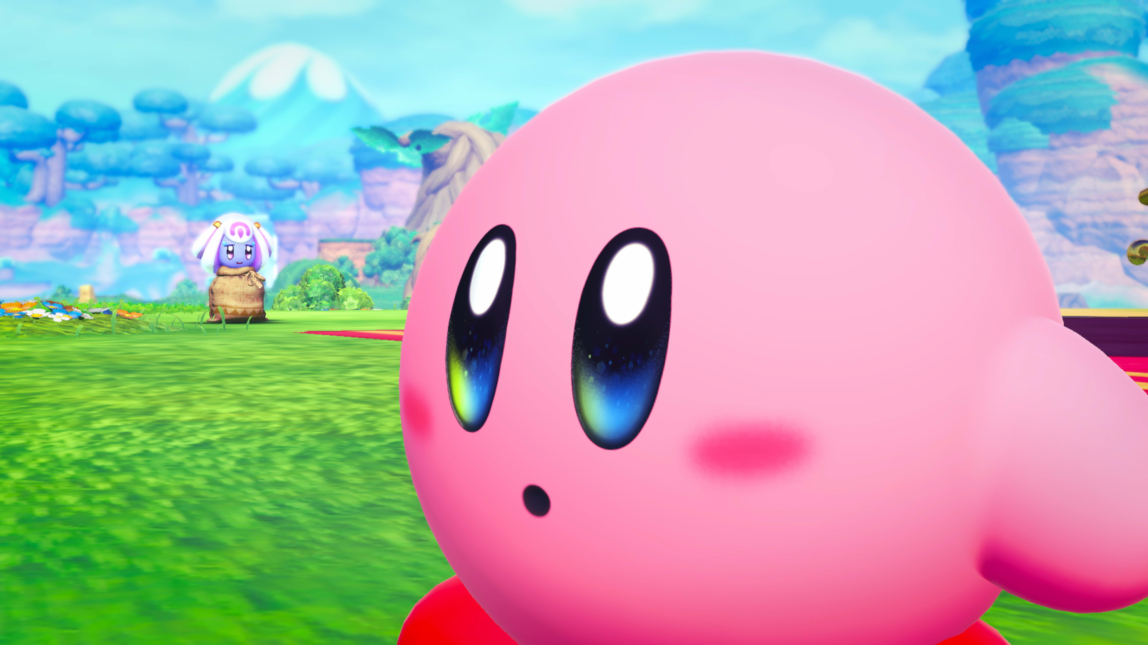 Kirby explores a bright landscape in Kirby and the World Beyond